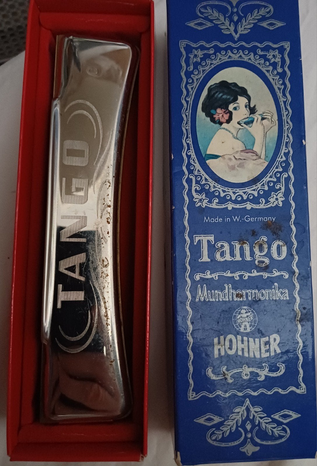 Vintage 'Tango' mondharmonica van Hohner, Ophalen