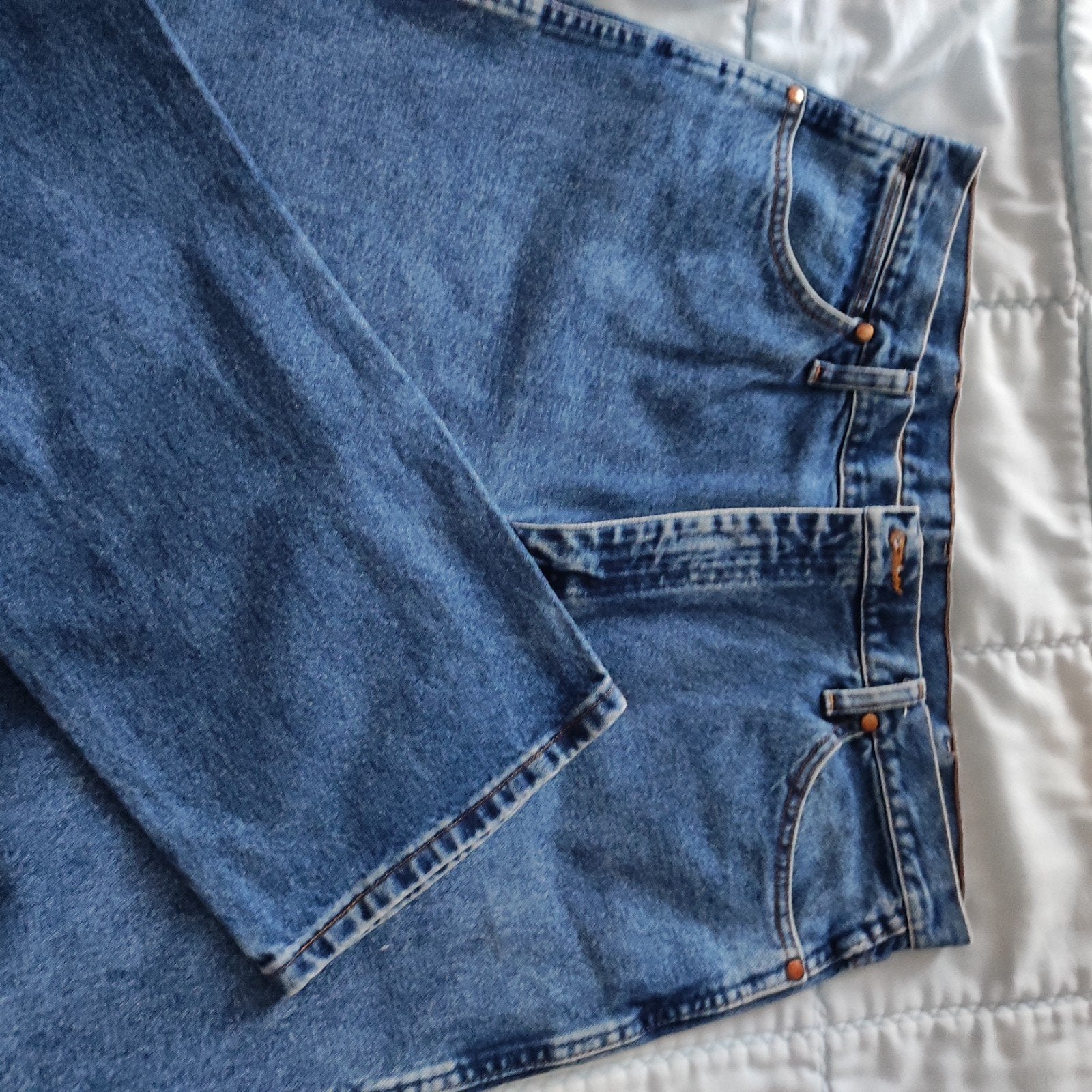 Jeans Wrangler homme, Enlèvement