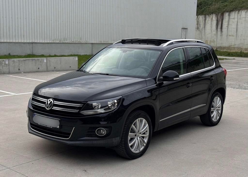 VW TIGUAN • 1.4 TSI • OPENDAK • ALCANTARA • GARANTIE, Auto's, Voorwielaandrijving, Euro 5, Zwart, 4 cilinders