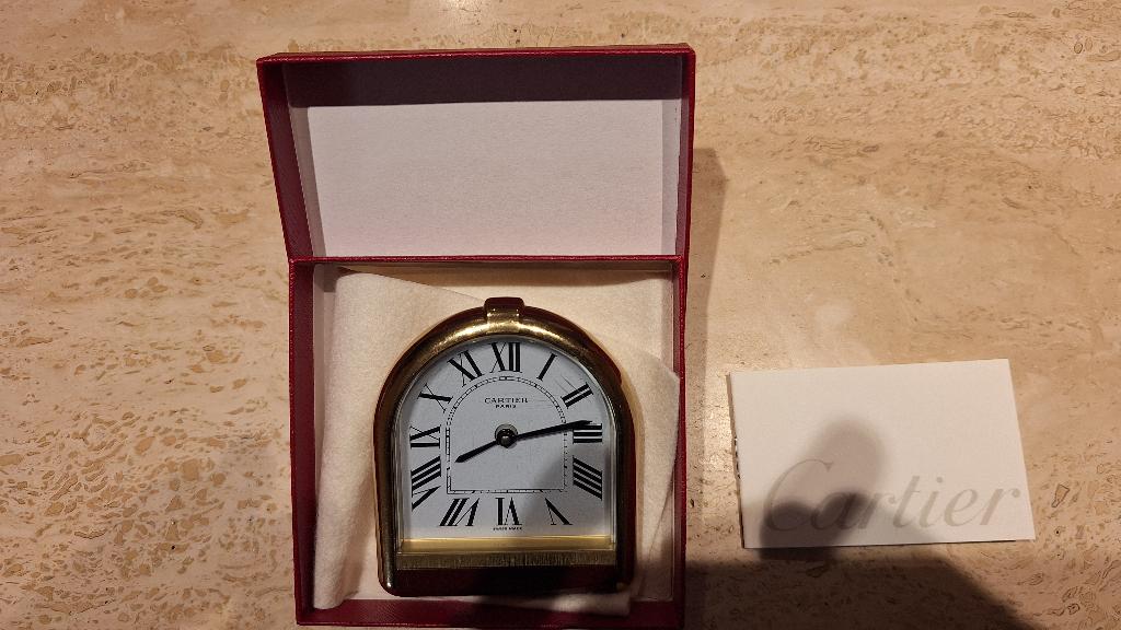 réveil Cartier, Ophalen