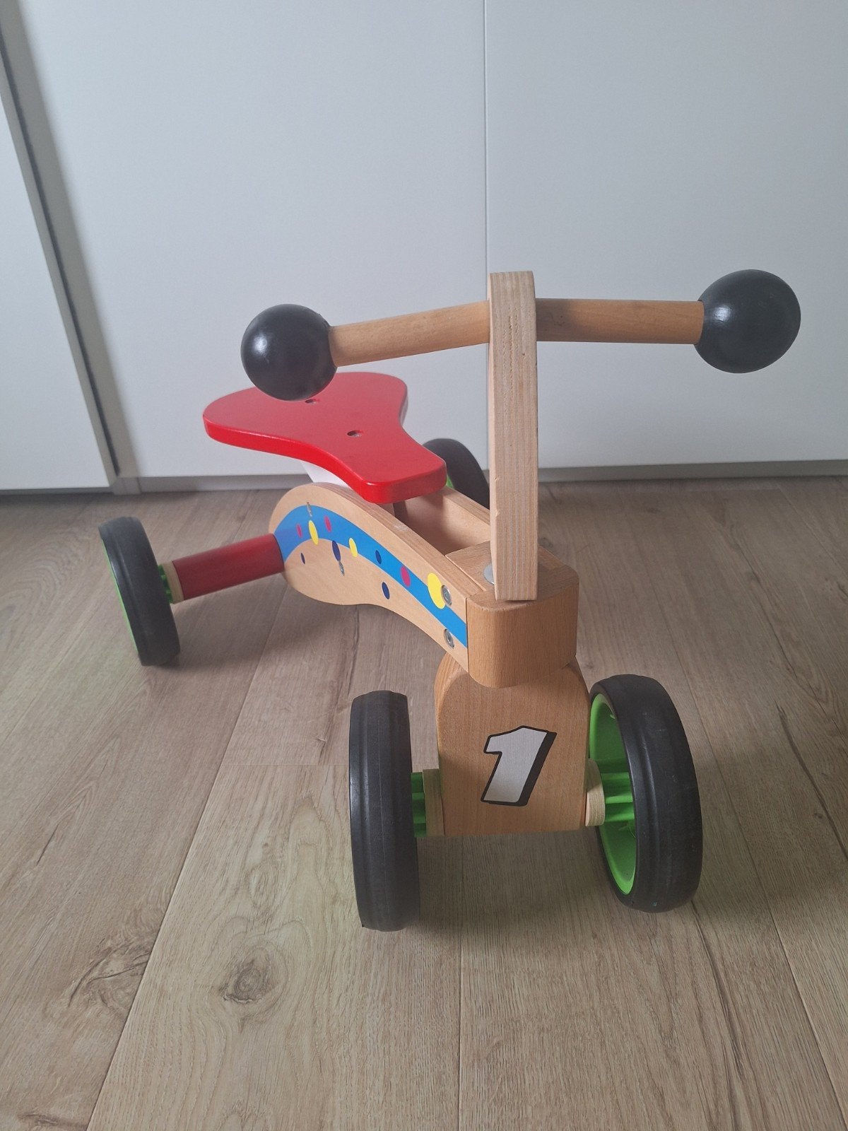 Houten loopfietsje 4 wielen, Ophalen