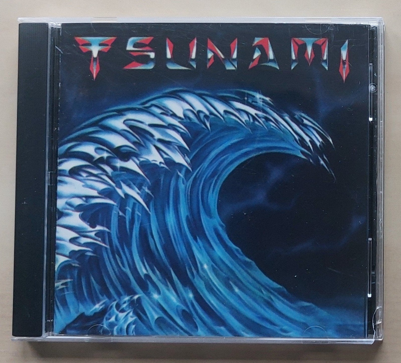 Tsunami  - Tsunami (cd) + 1 extra cd gratis, Inclusief boekje, Heavy metal, Gebruikt, Ophalen of Verzenden