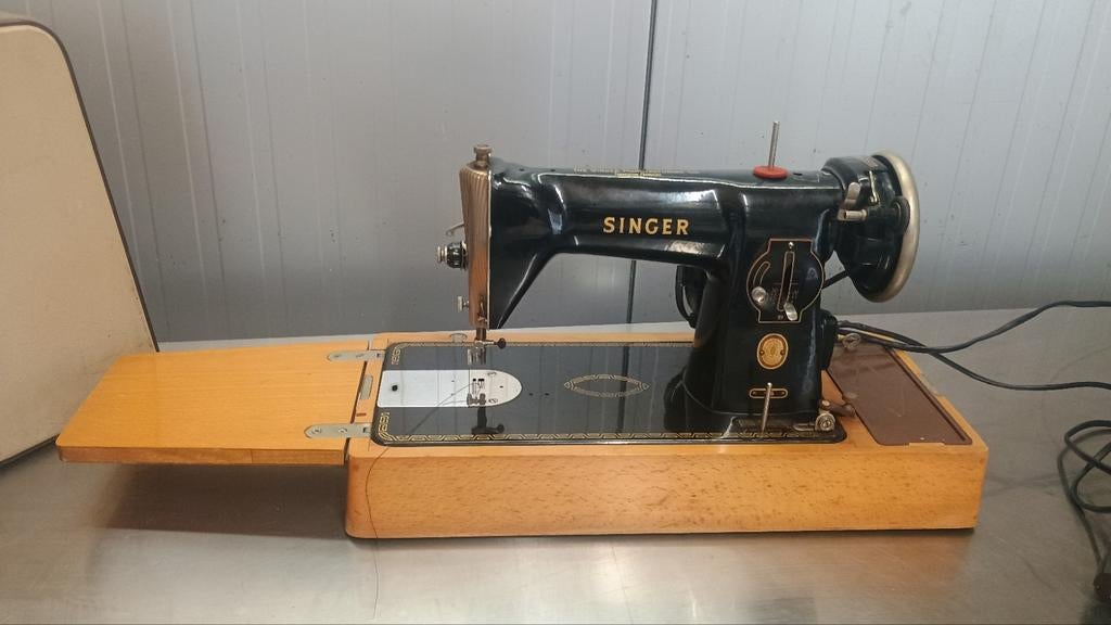 Vintage Singer naaimachine, Enlèvement