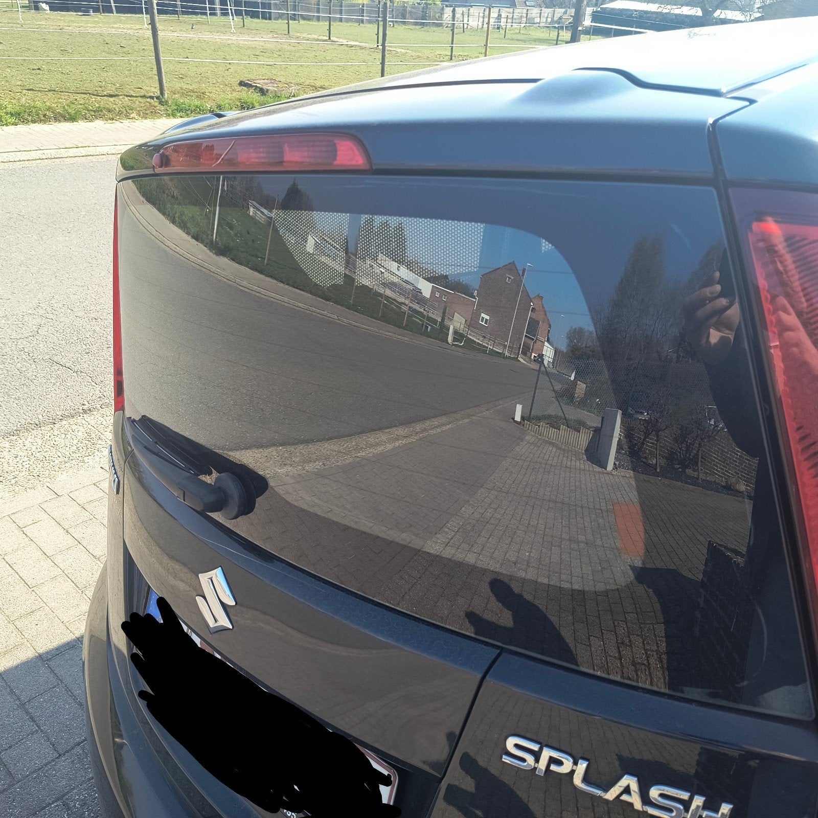 zonnescherm Suzuki Splash, Ophalen