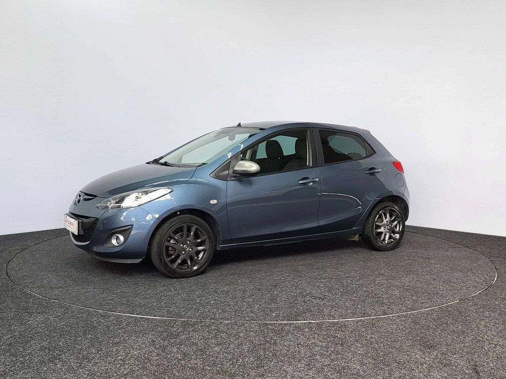 Mazda 2 1.3i | 2015 | Navigatie | Airco | Radio | Garantie |, https://public.car-pass.be/vhr/5ef7dcbb-3ca8-48a7-bb0c-95770851dd91