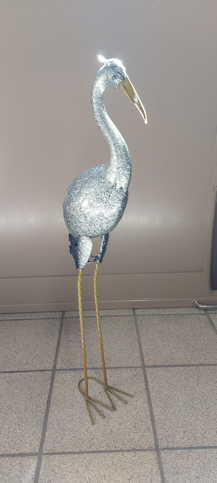 Metalen reiger. Grijs.H.90 cm., Ophalen