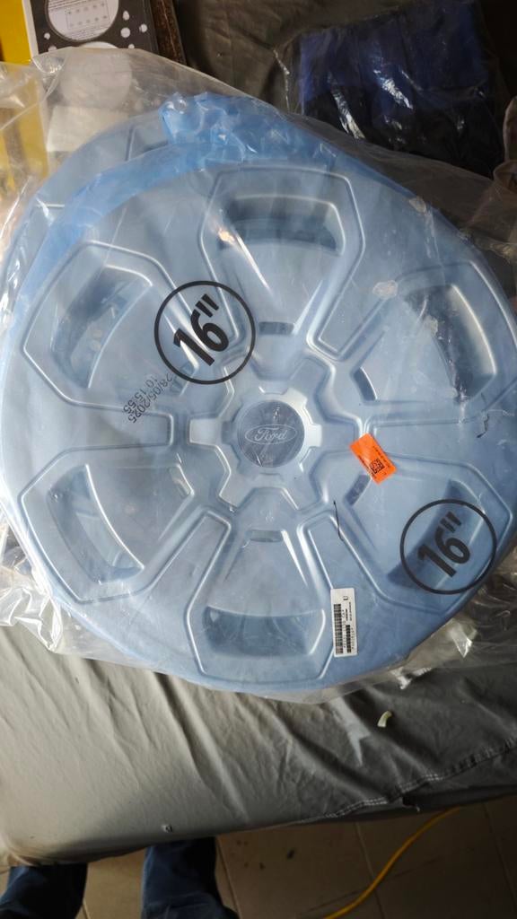 4 originele wieldeksels Ford nieuw, Ophalen