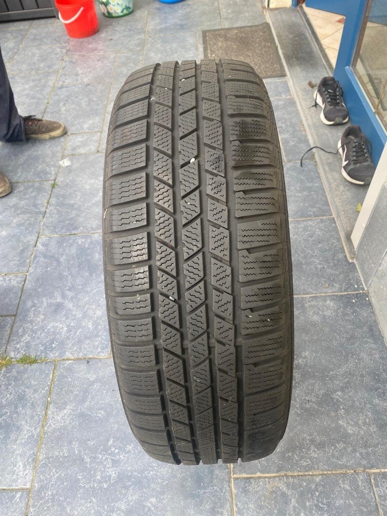 4 pneus d'hiver Continental 235/55 R19 105H — Bon état, Autos : Pièces & Accessoires, Pneus & Jantes, Pneu(s), Pneus hiver, 19 pouces