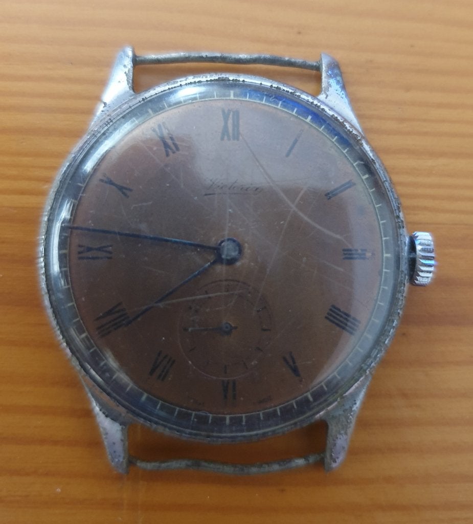 Montre très Ancienne Victoria mécanique, Handtassen en Accessoires, Horloges | Antiek, Overige merken, Staal, Polshorloge, 1930 tot 1960