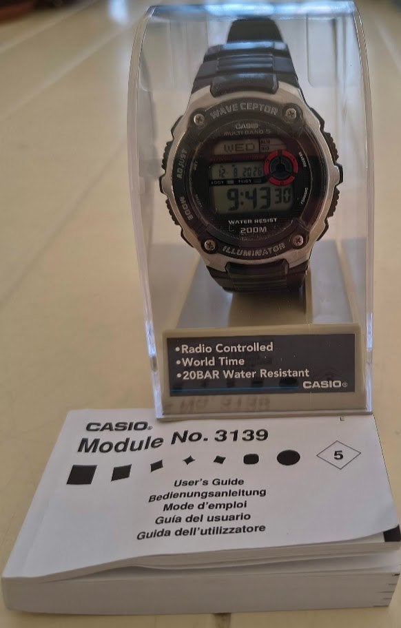 Casio Wave Ceptor WV-200E – radiografisch +  handleiding, Gebruikt, Polshorloge, Kunststof, Ophalen of Verzenden