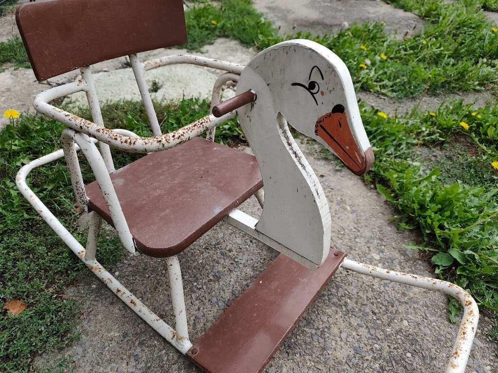 vintage kinderschommeleendje, Ophalen