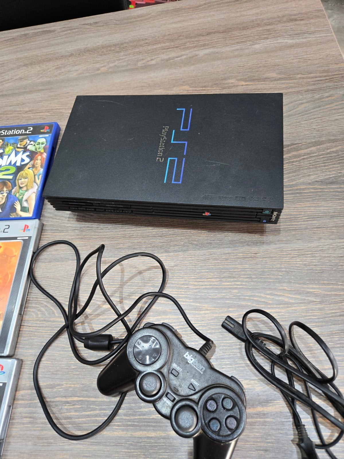 2 PlayStation 2 met 8 game 2-controller