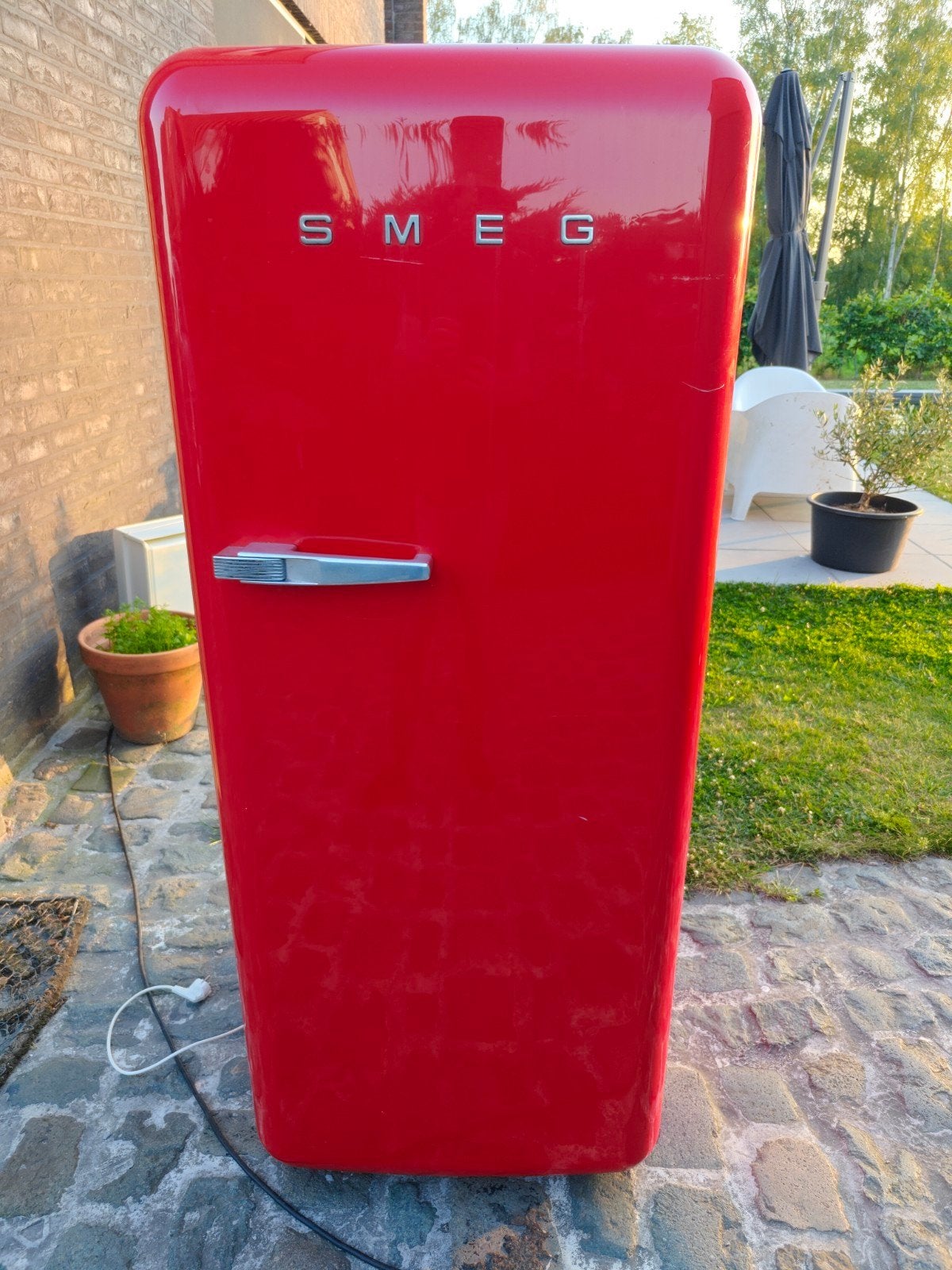 Rode SMEG koelkast - koelt niet meer zo goed, Ophalen