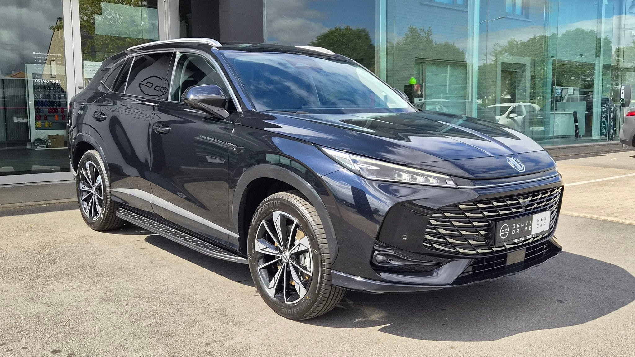 MG HS 1.5 T-GDi PHEV LUXURY ✅ 100 KM EV, Zwart, Leder, Bedrijf, Hybride Elektrisch/Benzine