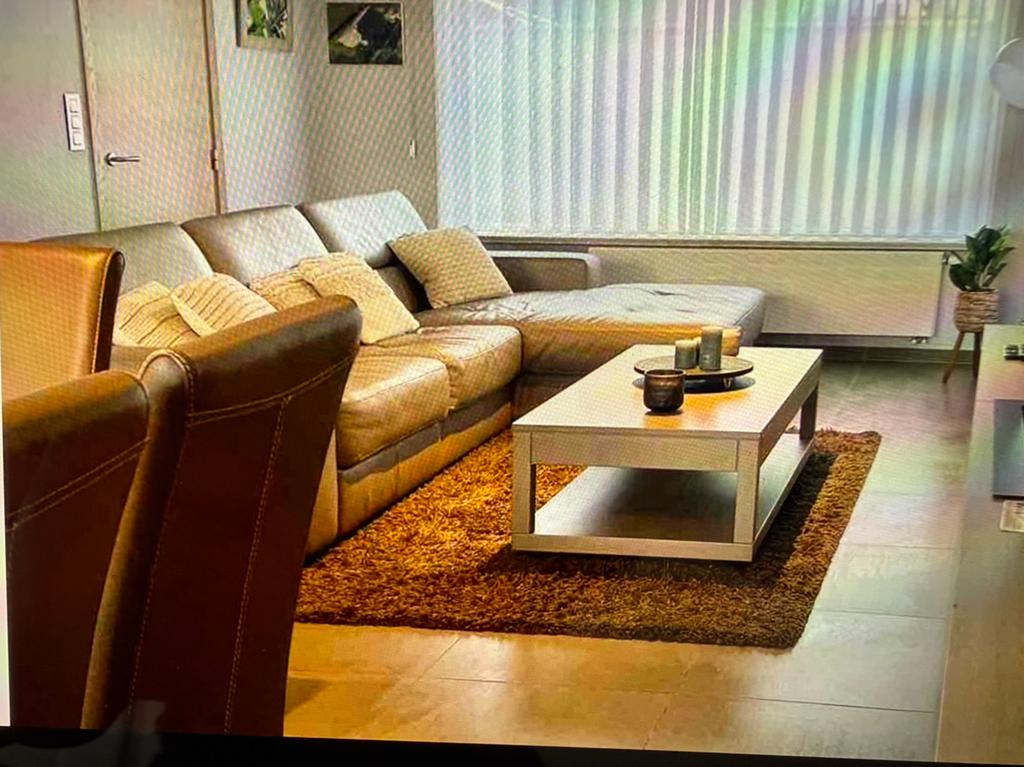 Lederen zetel met relax, Ophalen, Zo goed als nieuw