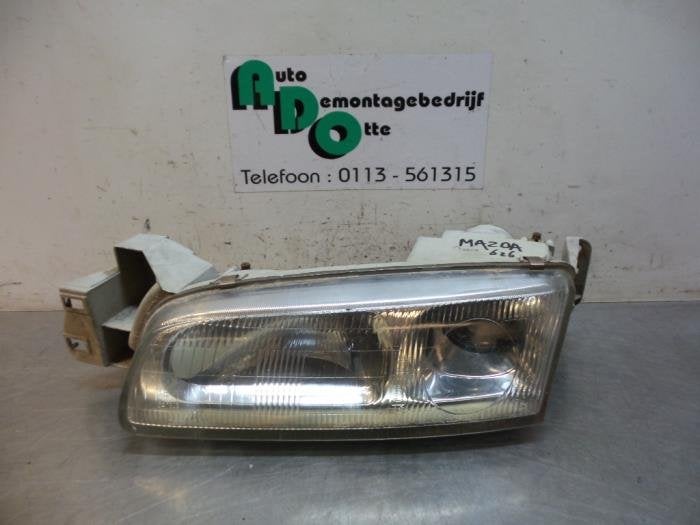 Phare gauche d'un Mazda 626 (626 GE 92-), Autos : Pièces & Accessoires, -, 3 mois de garantie, Mazda, Utilisé