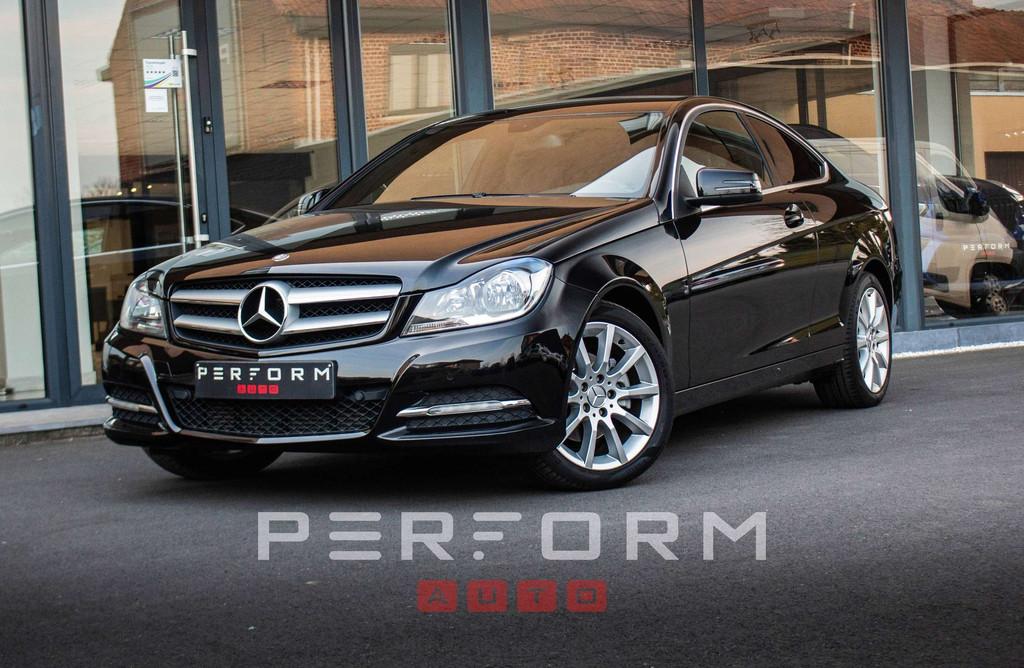 Mercedes-Benz C 220 d COUPÉ*AMG LINE*AUTOMAAT*NAVI*NIEUWSTA, Auto's, Automaat, Gebruikt, Zwart, 2100 kg