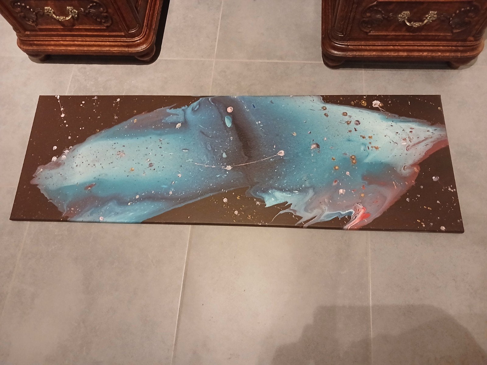 Gieten van verf op een frame van 120x40, Ophalen