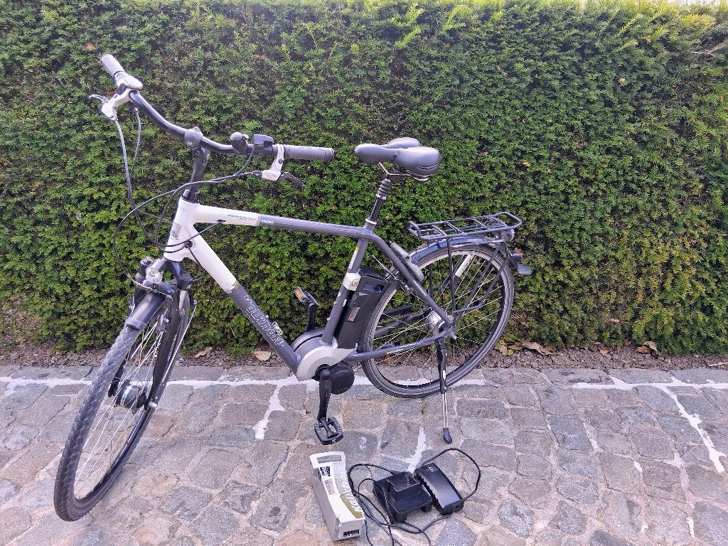 Electische  herenfiets, Ophalen