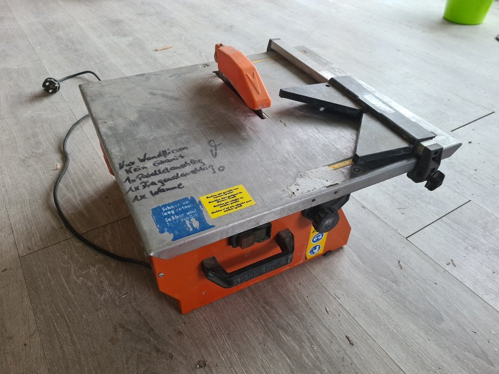 Zaagtafel voor tegels, Ophalen