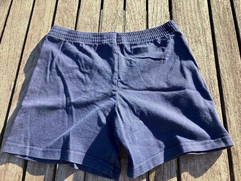 Donker blauw uniform sport shortje (Sint Ludgardis), Broek, Ophalen of Verzenden, Jongen, Gebruikt