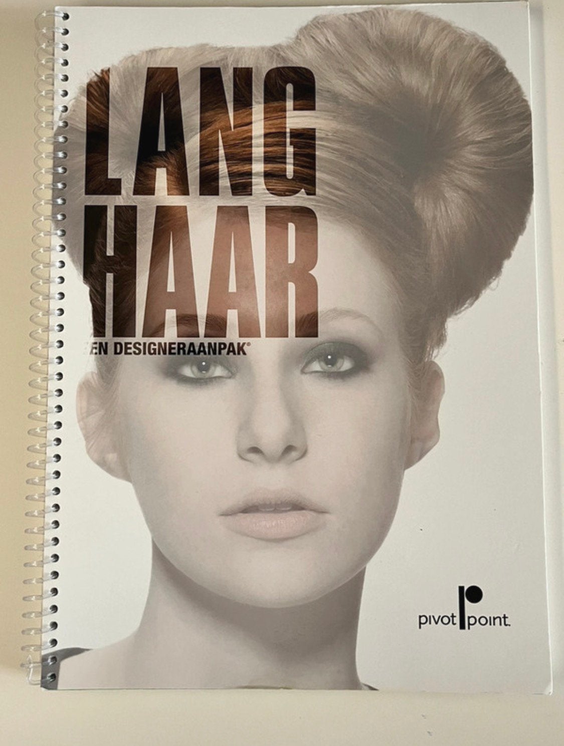 Lang haar pivot point, Ophalen, Zo goed als nieuw