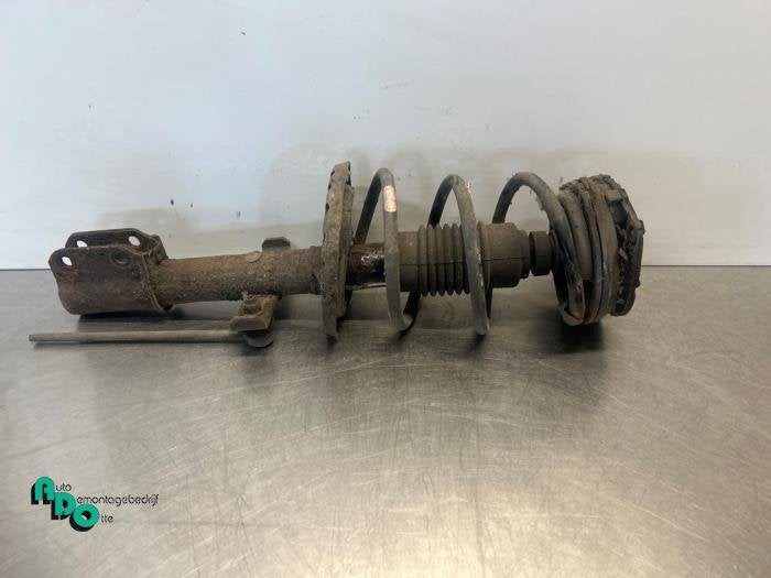 Schokdemperpoot links-voor van een Renault Clio (Clio 3 06-), Gebruikt, -, Renault, -