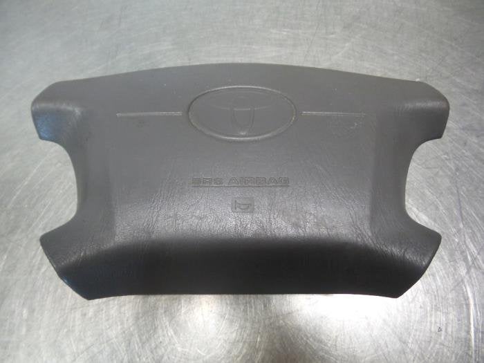 Airbag gauche (volant) d'un Toyota Corolla (Corolla 96-), -, 3 mois de garantie, Toyota, Utilisé