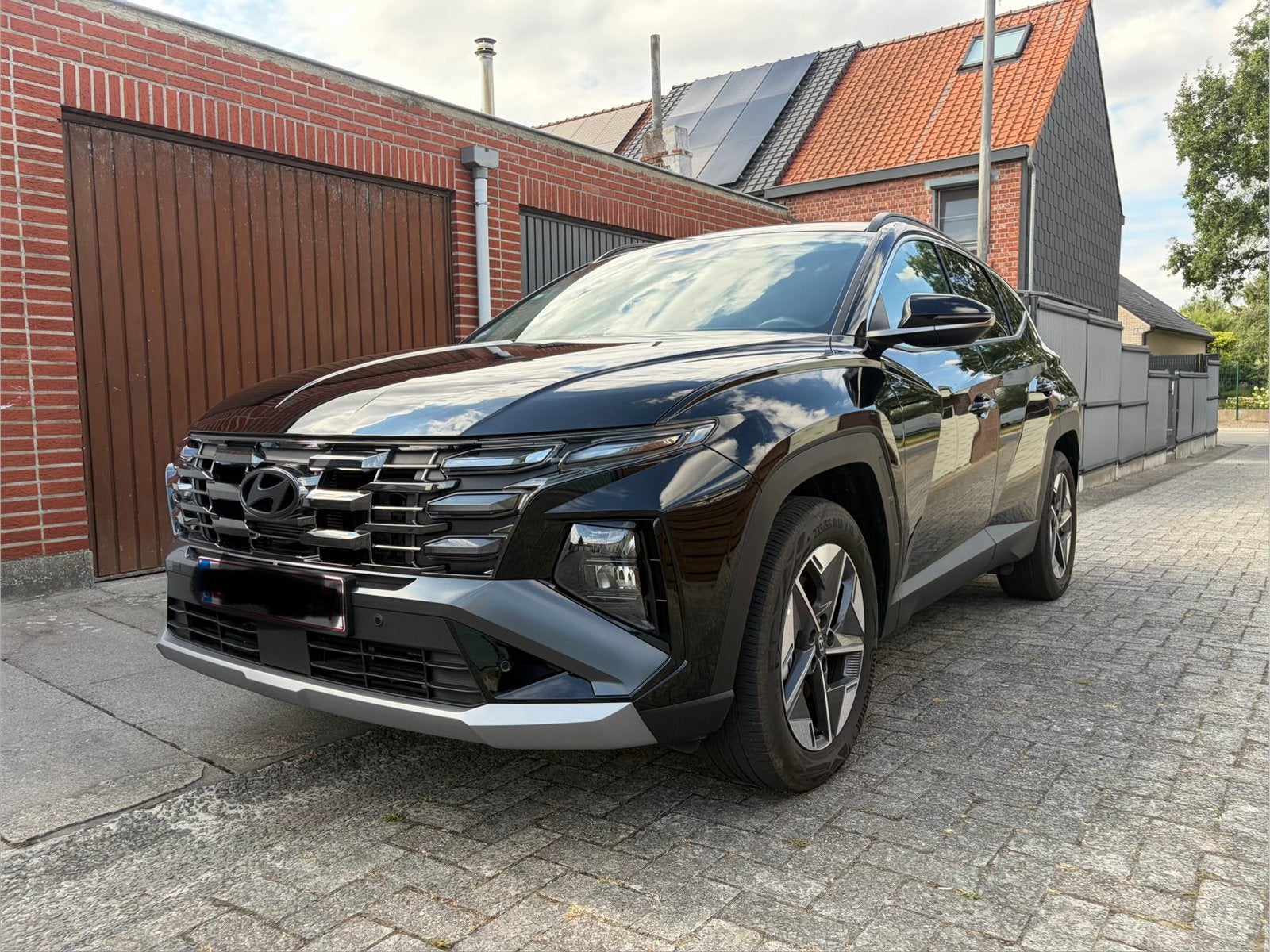 Hyundai Tucson HEV 1.6 T-GDi Feel ComfortPack, Auto's, 2175 kg, 4 cilinders, Leder en Stof, Zwart