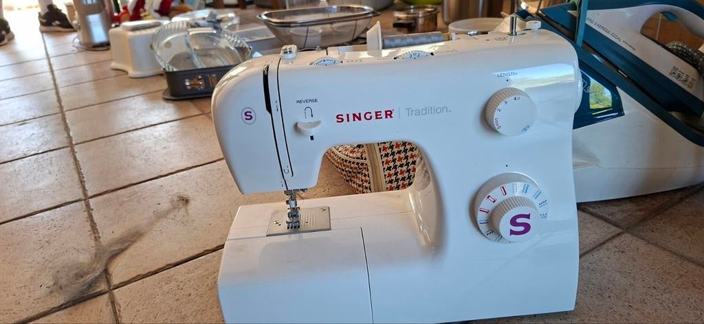 Naaimachine, Ophalen, Singer