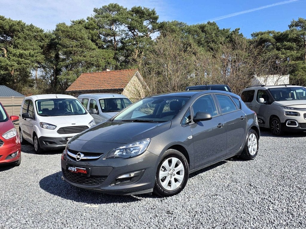 Opel Astra Turbo Benzine Weinig KM ParkeerS Airco Navi 1STe, Auto's, Opel, Gebruikt, Zwart, 4 cilinders, 89 kW