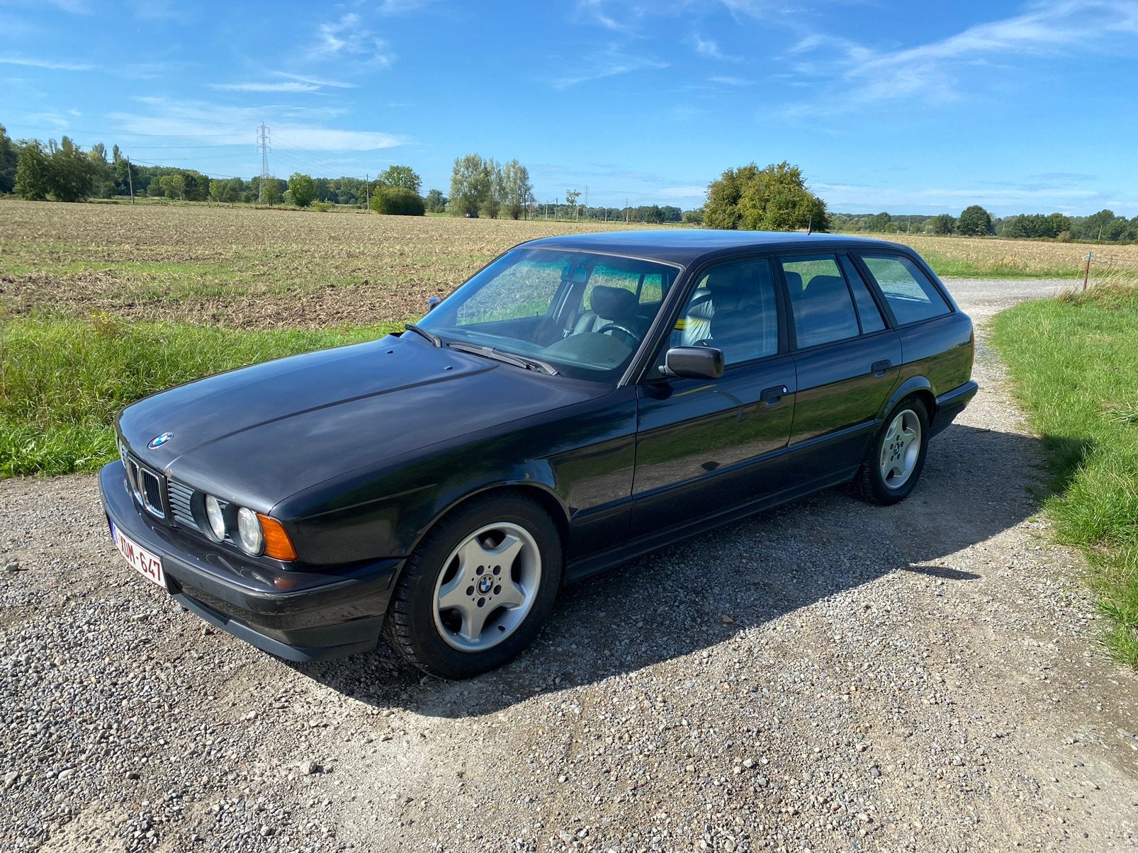 BMW E34 525iA Touring 1992, Auto's, BMW, Achterwielaandrijving, Zwart, Sound system, Zwart
