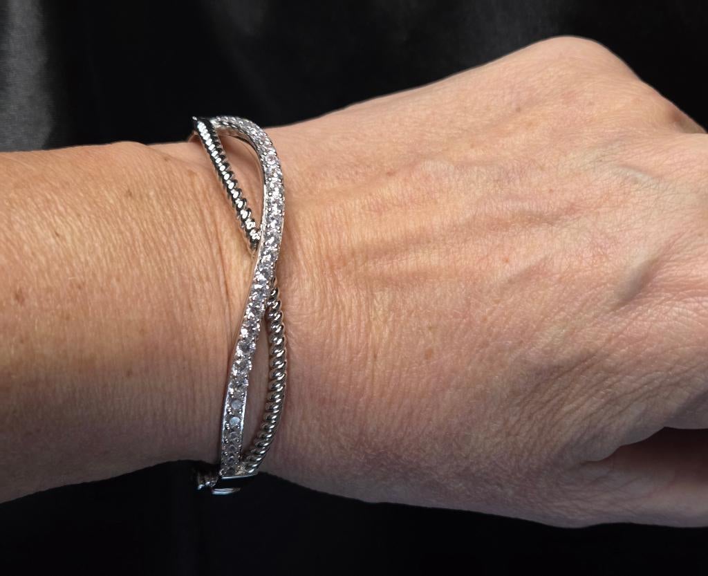 Zilver crossover slavenarmband met zirkonia's. 2026/99., Handtassen en Accessoires, Armbanden, Nieuw, Ophalen of Verzenden, Zilver