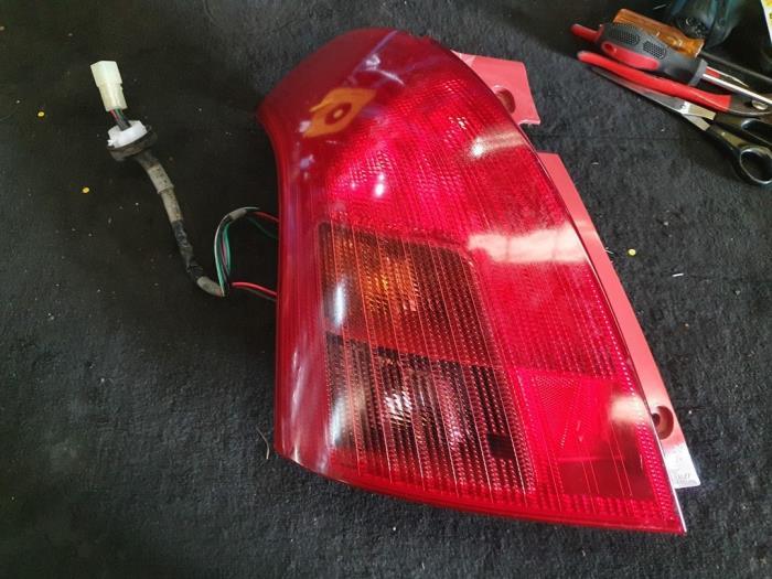 Feu arrière gauche d'un Suzuki Swift, -, 3 mois de garantie, Utilisé, -
