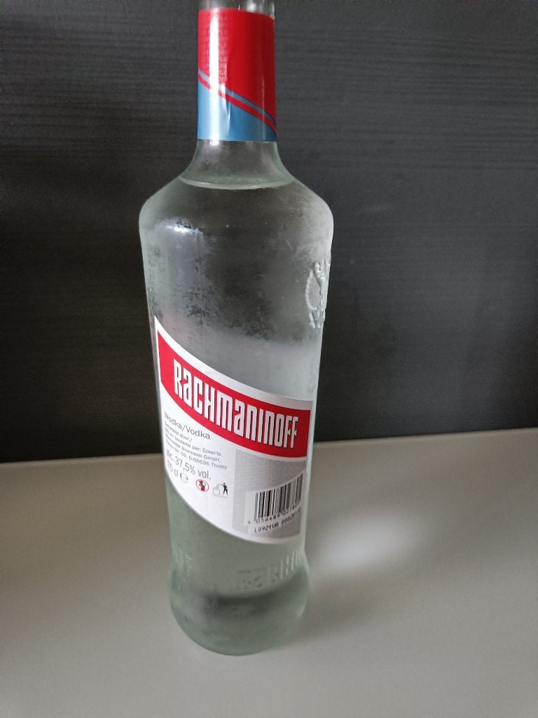 7 ongebruikte flessen diverse drank, Ophalen