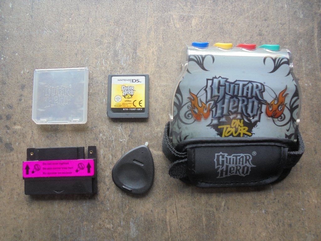 Guitar Hero On Tour voor DS (zie foto's), Games en Spelcomputers, Games | Nintendo DS, Muziek, Gebruikt, 1 speler, Ophalen of Verzenden