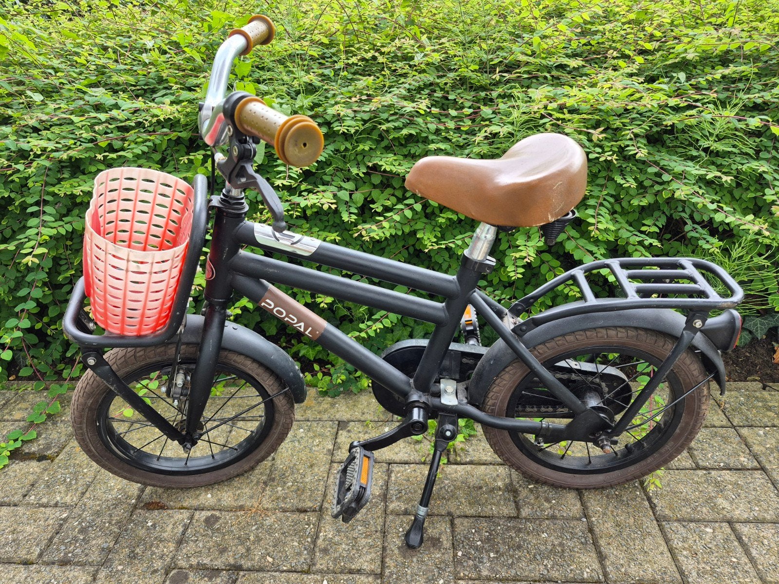 Kinderfiets met mandje, Ophalen