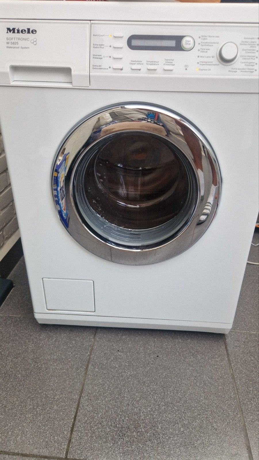 MIELE  wasmachine, Ophalen