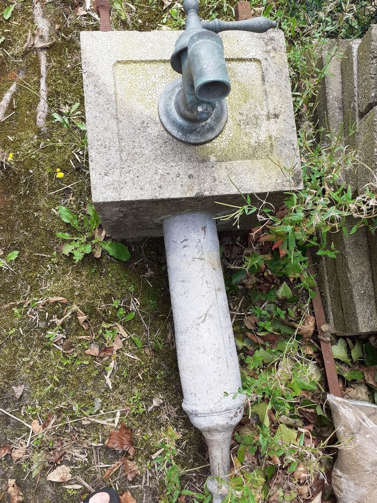 antieke waterpomp, Ophalen