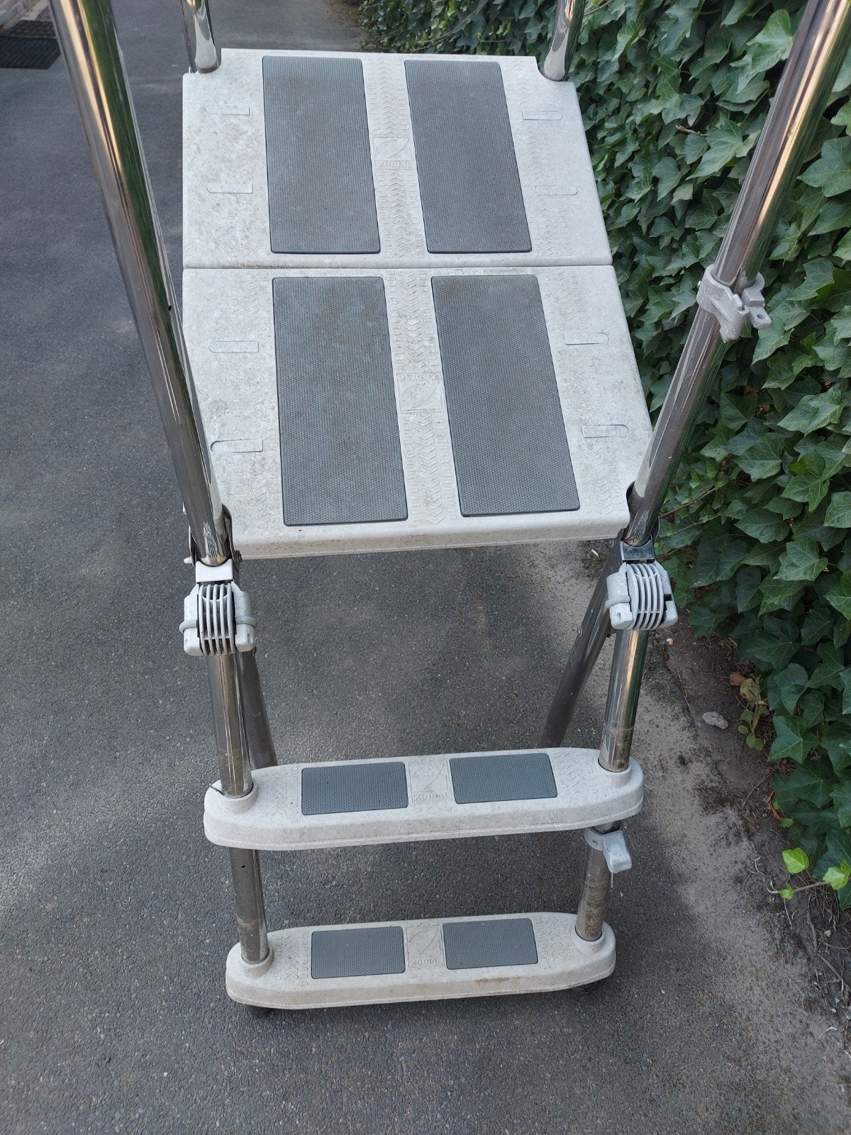 Ladder voor inbouwzwembad., Ophalen