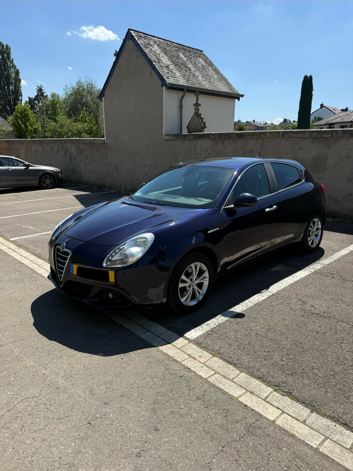 Alfa Romeo Giulietta 1.4 TB 16V Multiair TCT Turismo, Auto's, Alfa Romeo, Euro 5, Zwart, 4 cilinders, Blauw