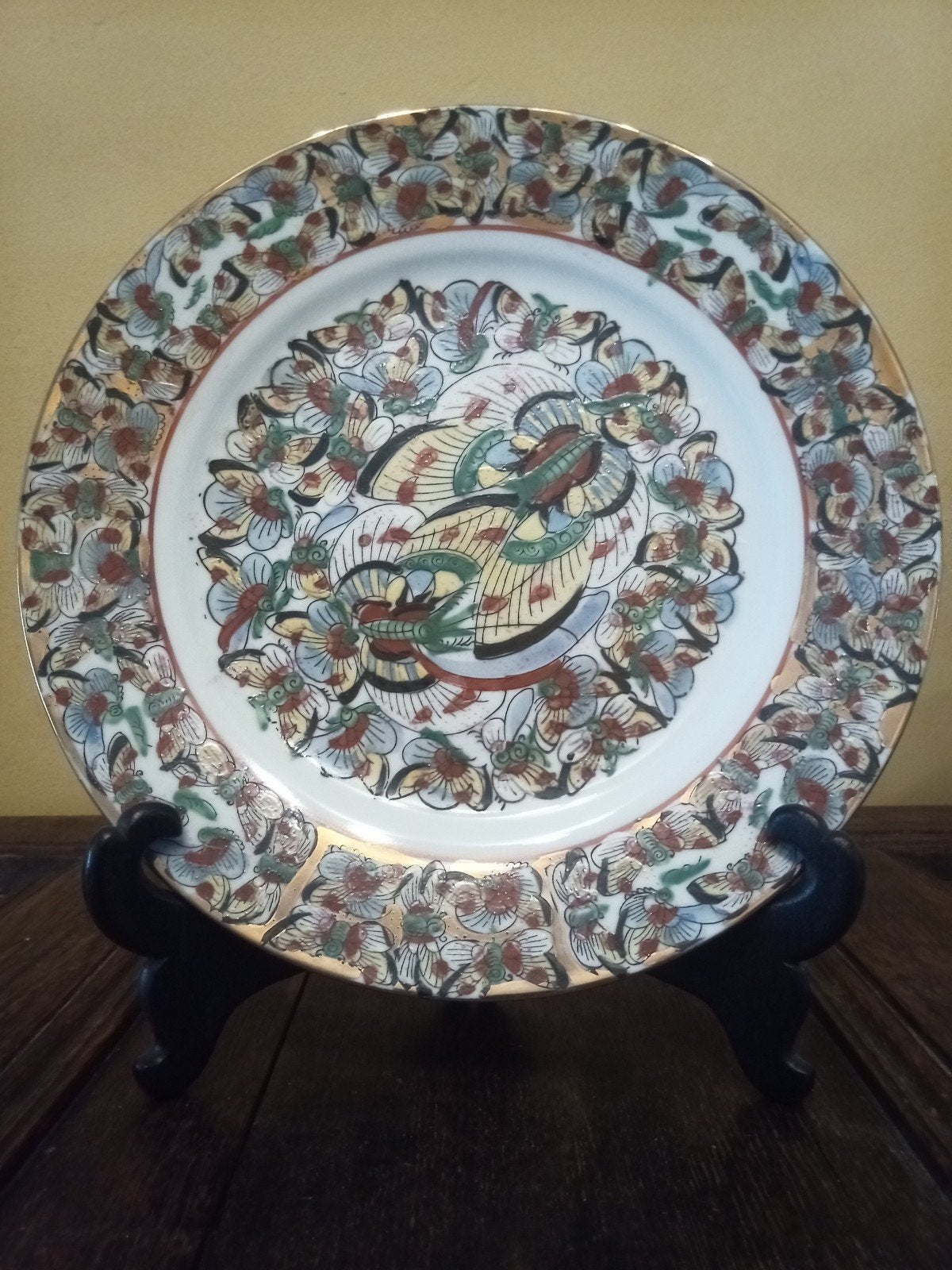 Assiette en porcelaine 'mille papillons', Ophalen