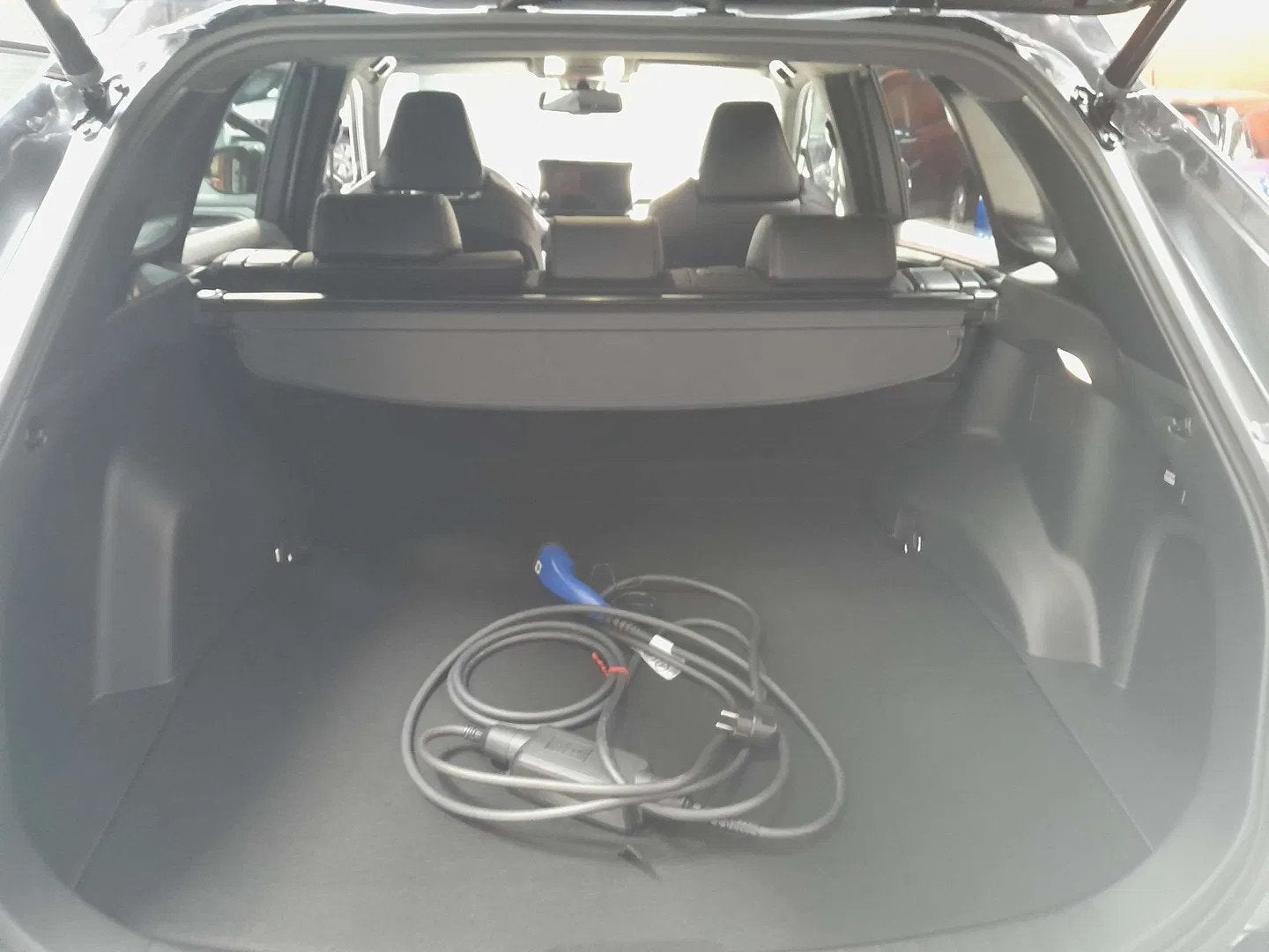 Suzuki Across Across PLUG-IN HYBRID (bj 2024, automaat), Auto's, Automaat, Gebruikt, Zwart, 4 cilinders
