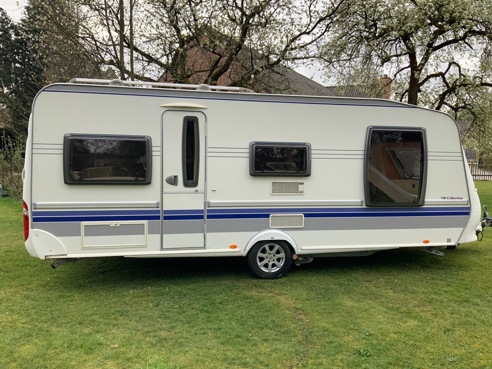 Hobby 570 vip met Levooz voortent, luifel, schuifdeur, Particulier, Koelkast, Hobby