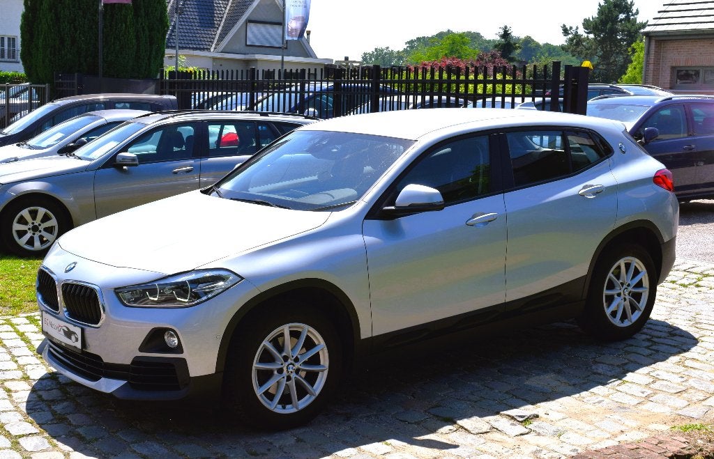 BMW X2 sDrive18i/Automaat/1st Owner/HISTORY/GARANTIE, Auto's, BMW, Bluetooth, 5 zetels, SUV of Terreinwagen, Zilver of Grijs
