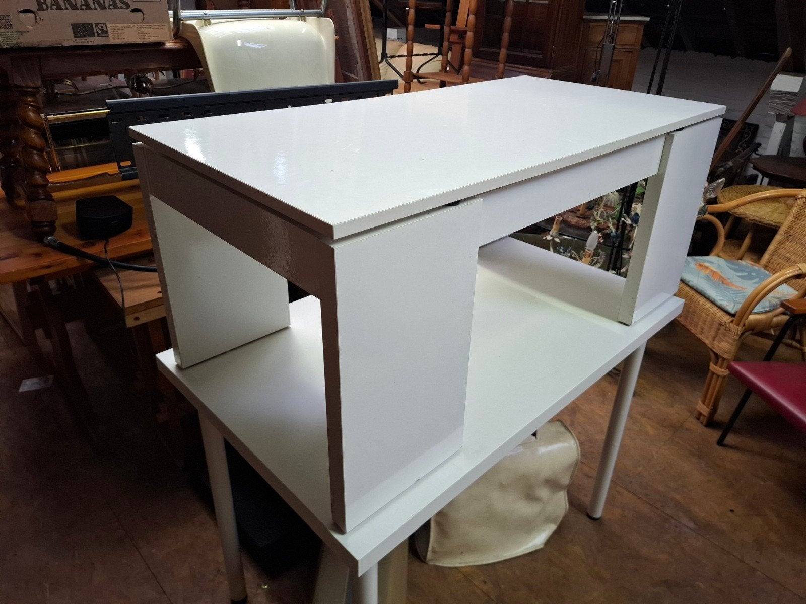 Table basse avec partie élevée possible., Enlèvement