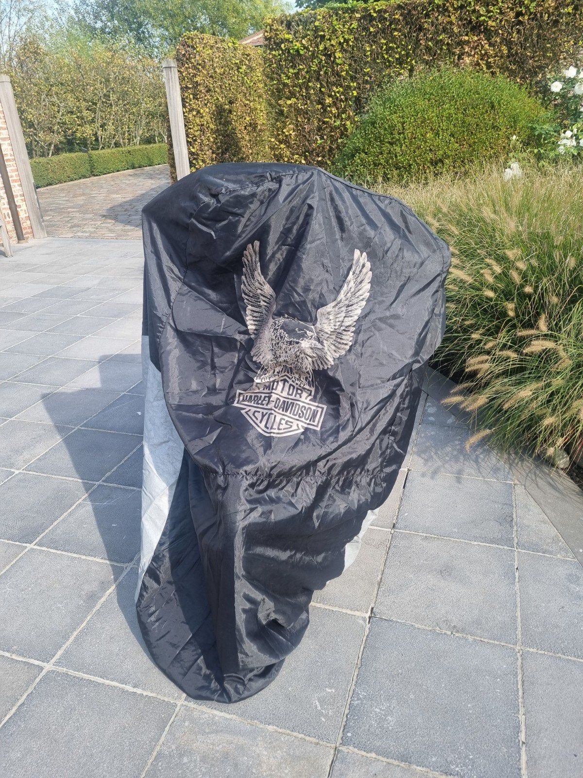 bâche de moto, Enlèvement