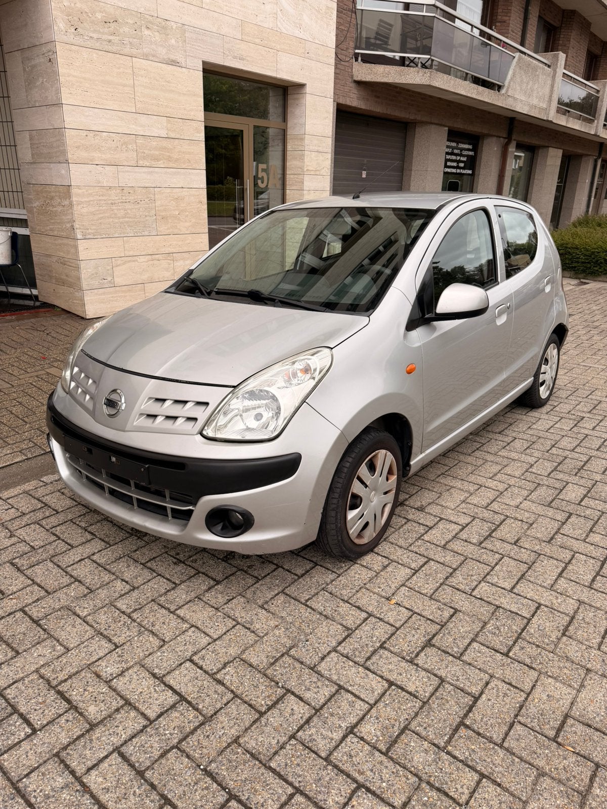 Nissan Pixo 1.0i - Manueel - 2011 - Benzine - 145.000km, Autos, Achat, Boîte manuelle, Noir, 5 portes