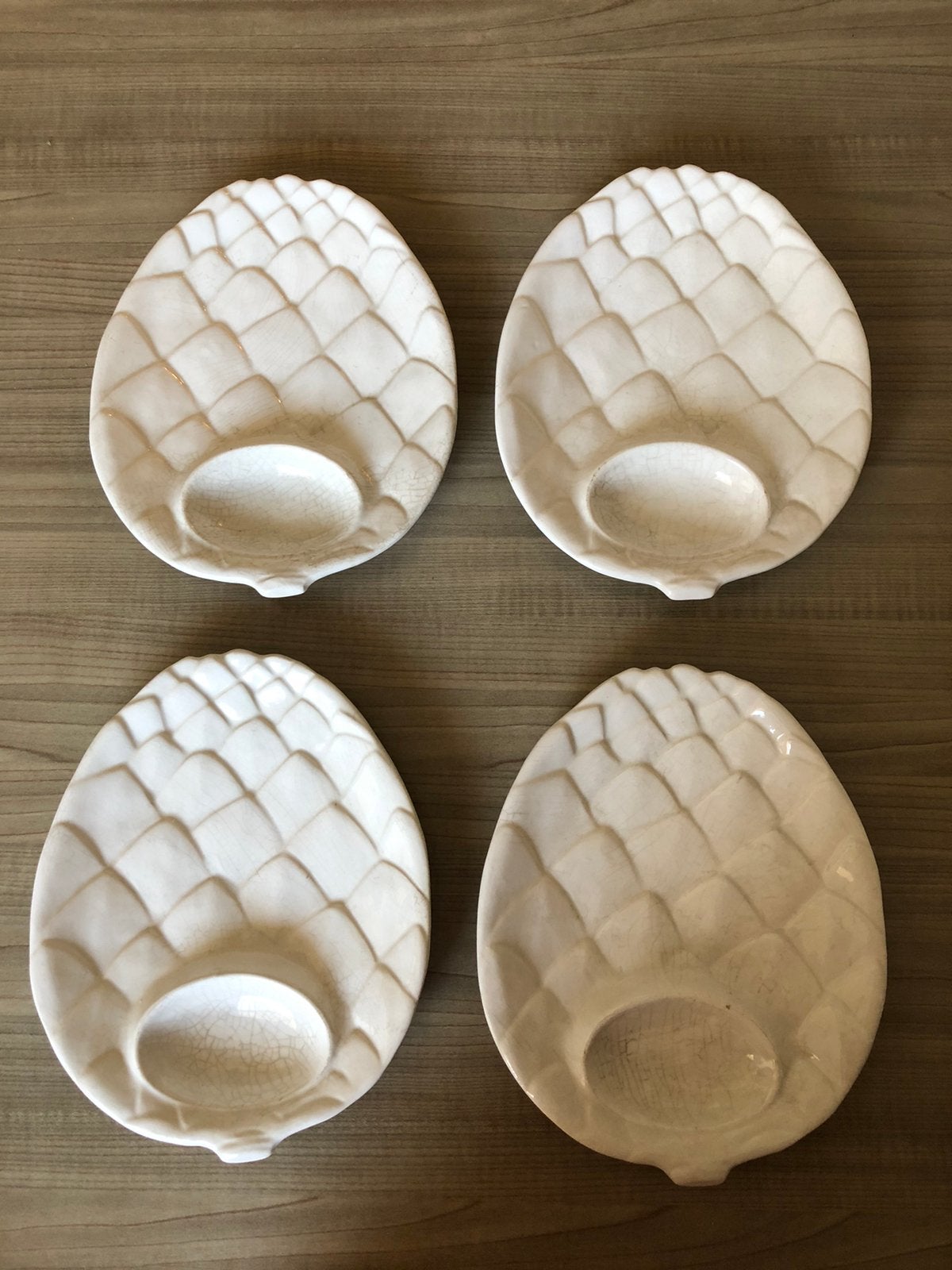 4 assiettes à artichauts fantastiques, Enlèvement