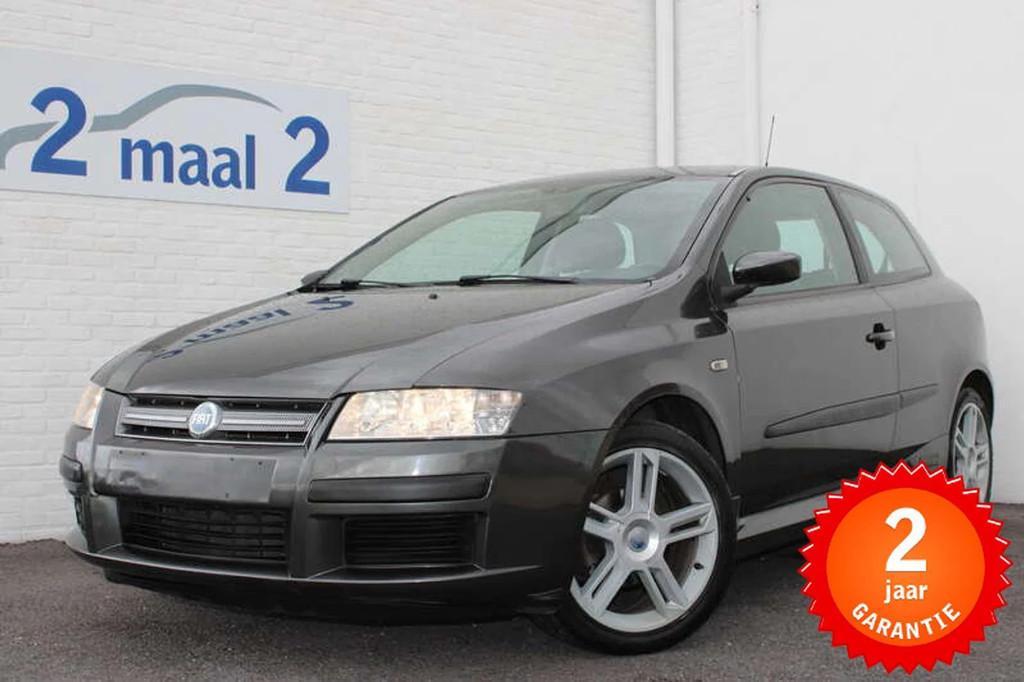 Fiat Stilo 1.4i 16v Racing inclusief 2 JAAR garantie!, Auto's, Gebruikt, Zwart, 95 pk, Parkeersensor